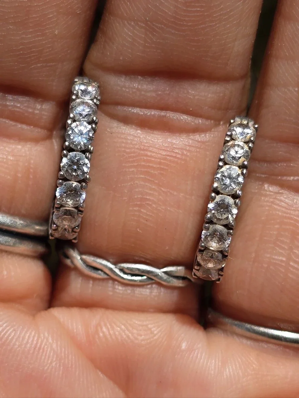 Elegant channel set sparkling CZ diamonds half filigree hoop earrings